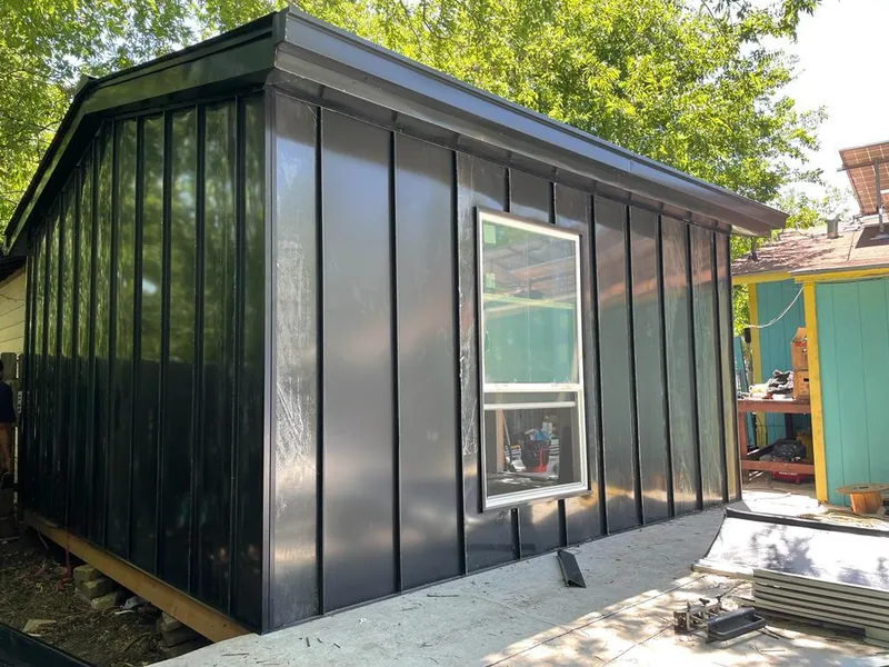 Black standing seam metal wall panels for Roof Inspection in York